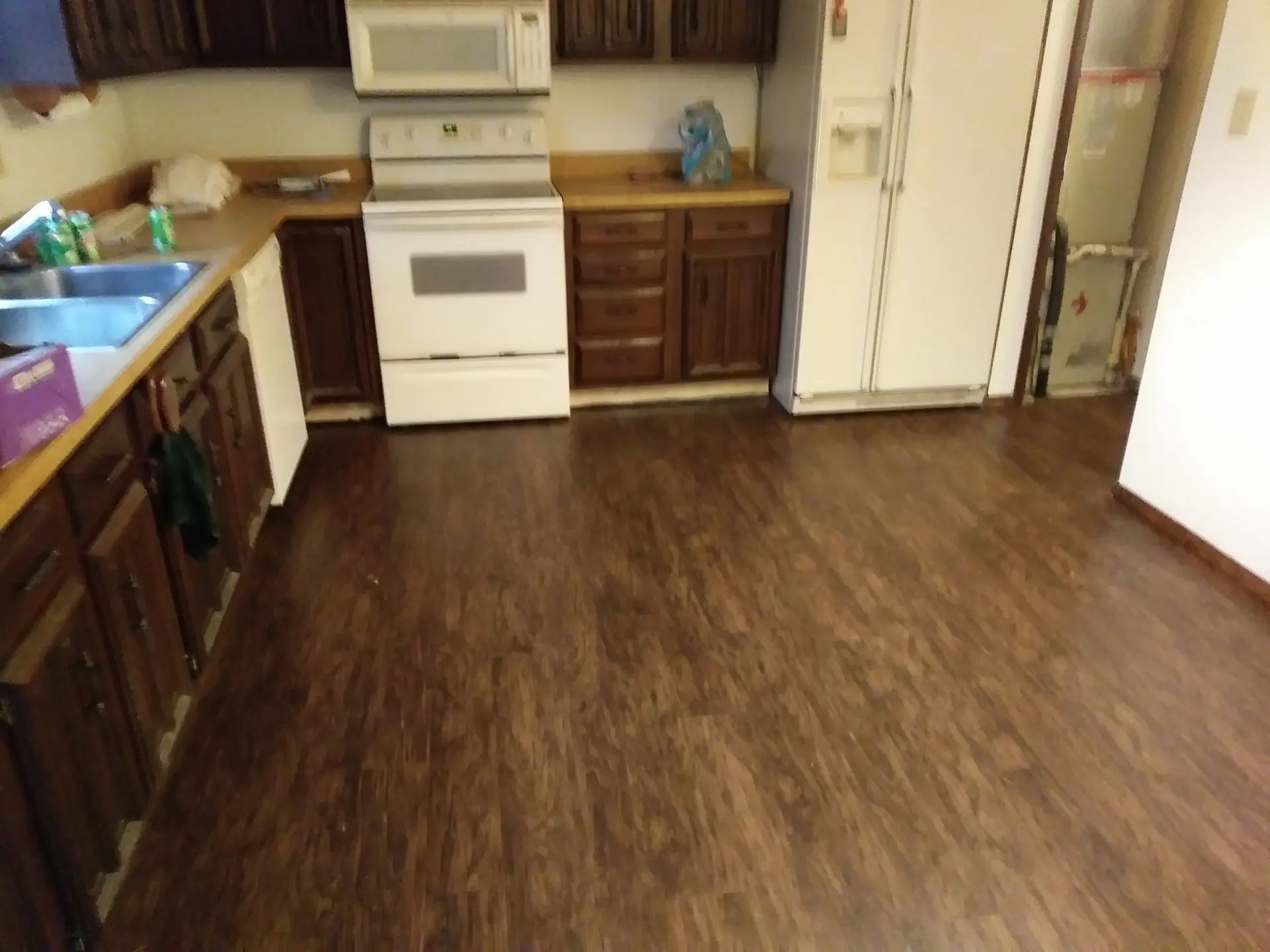 Installation for Store-Bought Flooring by Happy Feet Flooring LLC